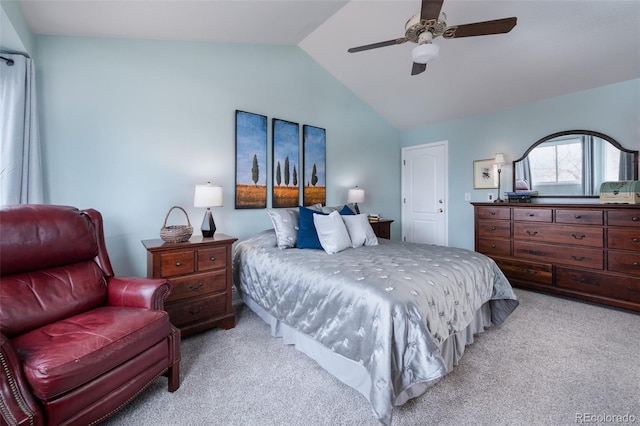 carpeted bedroom featuring ceiling fan and lofted ceiling