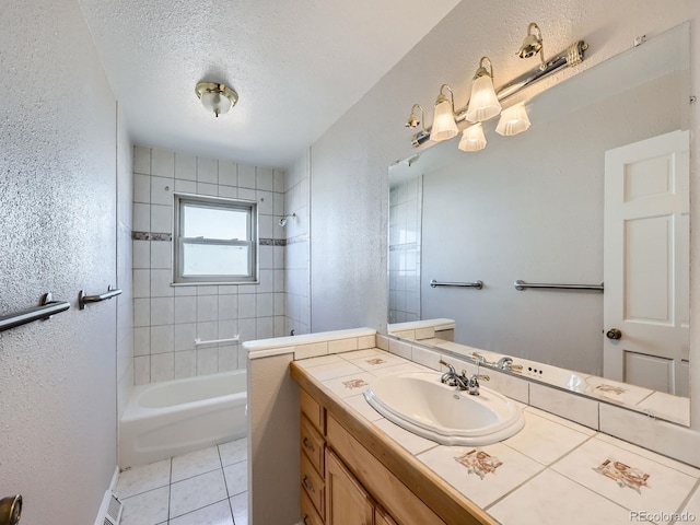 bathroom with shower / bath combination, a textured wall, a textured ceiling, and tile patterned floors