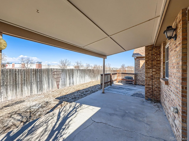 view of patio / terrace with fence