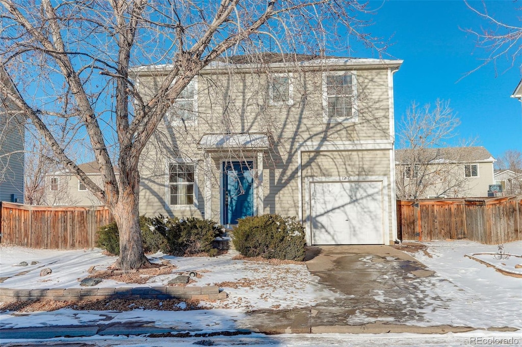 view of front property featuring a garage