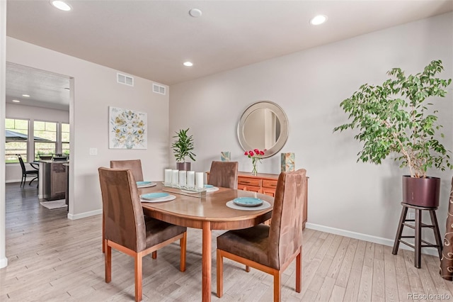 15647 Weaver Gulch Dr, Morrison, CO 80465 - dining space with light wood-type flooring and recessed lighting