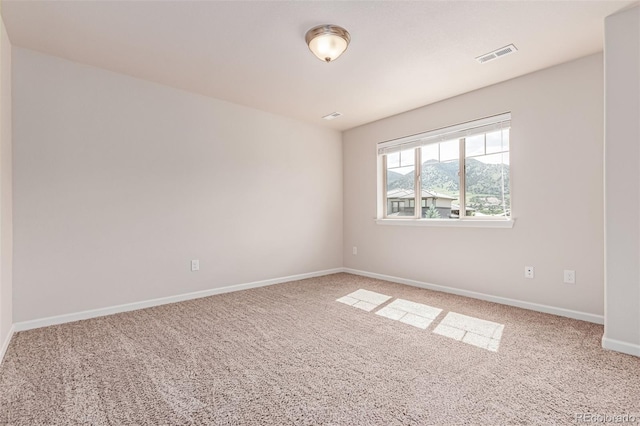 15647 Weaver Gulch Dr, Morrison, CO 80465 - carpeted empty room with baseboards