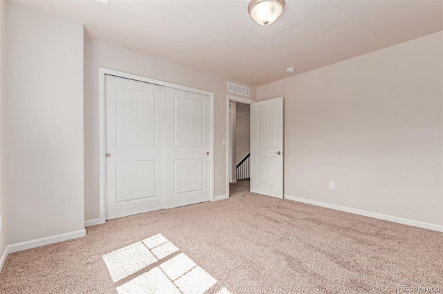 15647 Weaver Gulch Dr, Morrison, CO 80465 - unfurnished bedroom featuring carpet floors and a closet