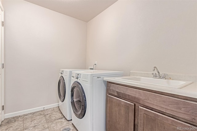 15647 Weaver Gulch Dr, Morrison, CO 80465 - laundry area featuring separate washer and dryer and cabinet space