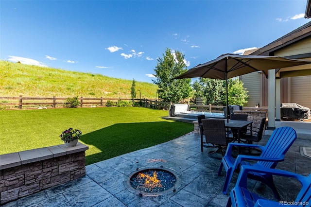 15647 Weaver Gulch Dr, Morrison, CO 80465 - fenced backyard with a patio area, grilling area, and outdoor dining area