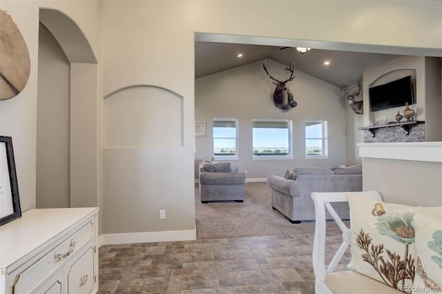 living room with lofted ceiling