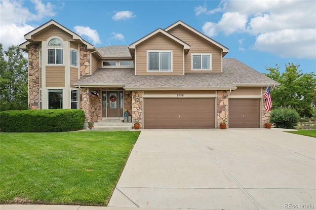 9158 Forest St, Firestone, CO 80504 - view of front of property with stone siding, a front lawn, concrete driveway, and a shingled roof
