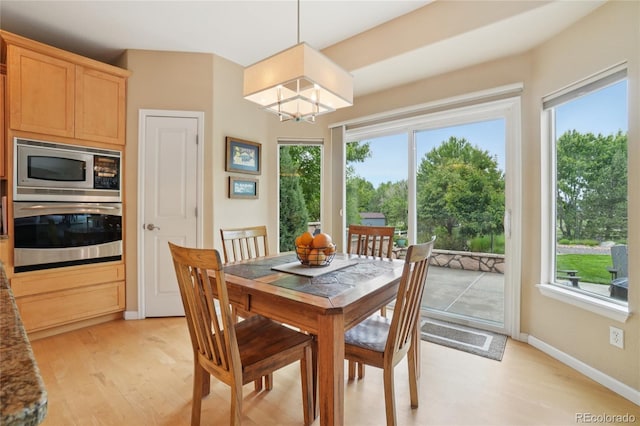 9158 Forest St, Firestone, CO 80504 - dining room featuring healthy amount of natural light, light wood-style floors, and baseboards