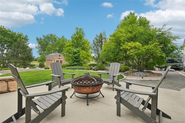 9158 Forest St, Firestone, CO 80504 - view of patio with a fire pit
