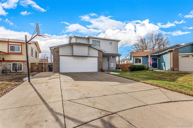 view of front of home with brick siding, fence, a front yard, a garage, and driveway