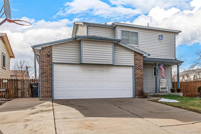 view of front of property featuring a garage, brick siding, concrete driveway, and fence