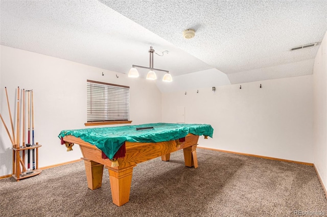 game room with visible vents, baseboards, a textured ceiling, and vaulted ceiling