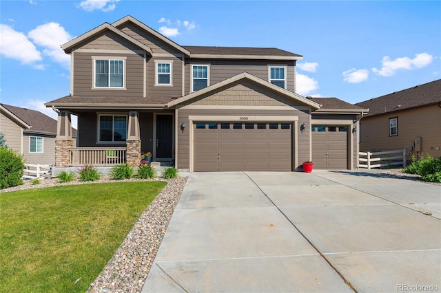 craftsman-style home featuring fence, a porch, an attached garage, a front lawn, and concrete driveway