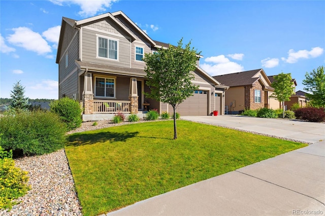 craftsman inspired home featuring driveway, stone siding, a porch, a front yard, and a garage