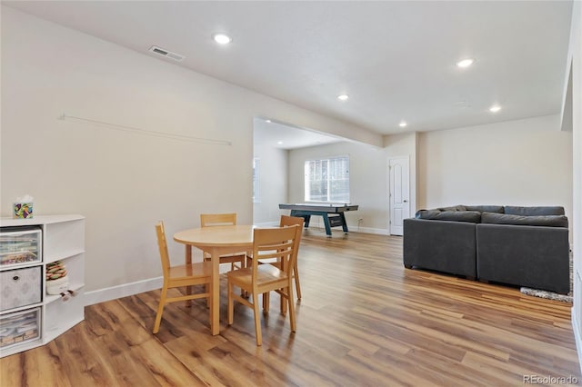 dining space with recessed lighting, visible vents, baseboards, and light wood-style floors