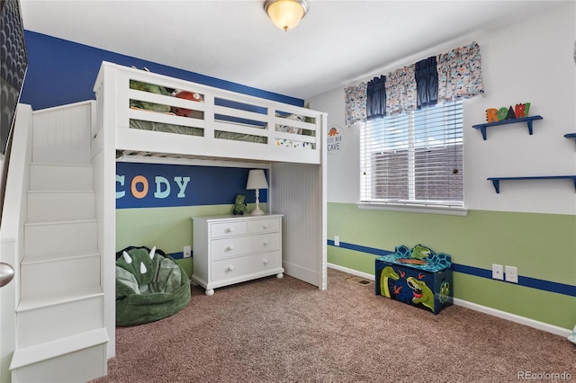 bedroom with visible vents, baseboards, and carpet