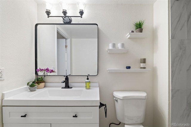 601 W 11th Ave Unit 910, Denver, CO 80204 - bathroom featuring toilet and vanity