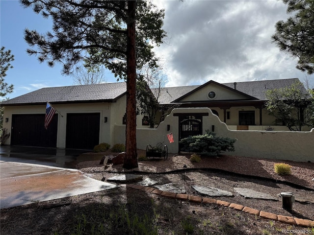 17995 Minglewood Trl, Monument, CO 80132 - ranch-style home featuring an attached garage, concrete driveway, stucco siding, and roof with shingles