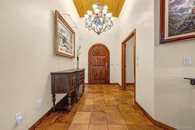 17995 Minglewood Trl, Monument, CO 80132 - foyer featuring wood ceiling, a chandelier, and high vaulted ceiling