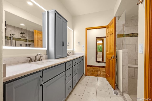 17995 Minglewood Trl, Monument, CO 80132 - full bath featuring double vanity, a walk in shower, tile patterned floors, and recessed lighting