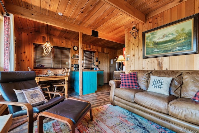 living room with wood walls, beam ceiling, wood ceiling, and hardwood / wood-style floors