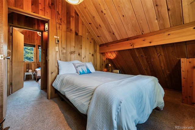 carpeted bedroom featuring lofted ceiling, wooden walls, and wood ceiling