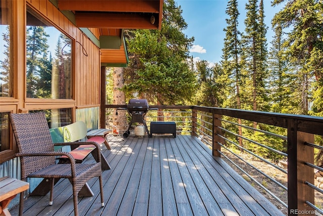 wooden terrace with grilling area