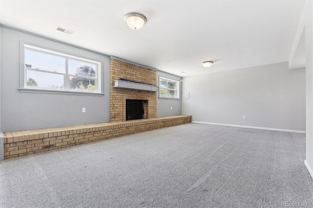 11815 E Louisiana Ave, Aurora, CO 80012 - unfurnished living room featuring carpet floors and a fireplace