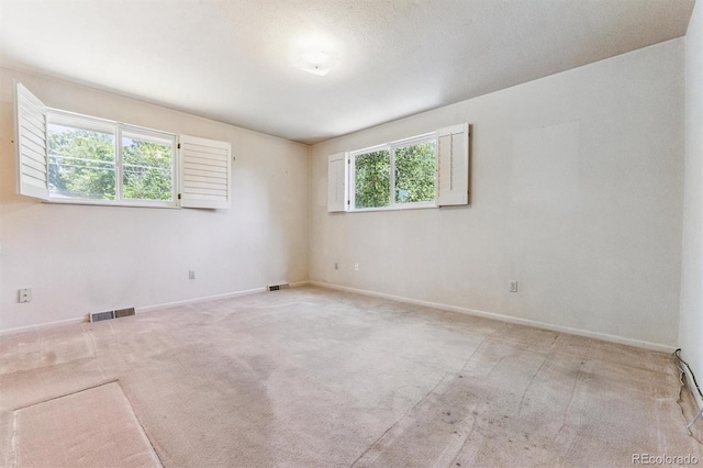11815 E Louisiana Ave, Aurora, CO 80012 - unfurnished room featuring carpet floors and baseboards