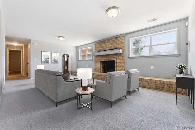 11815 E Louisiana Ave, Aurora, CO 80012 - carpeted living area with a fireplace