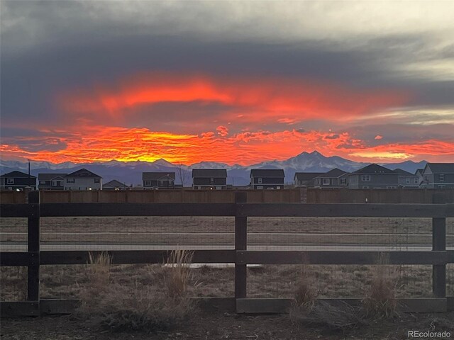 property view of mountains with a residential view