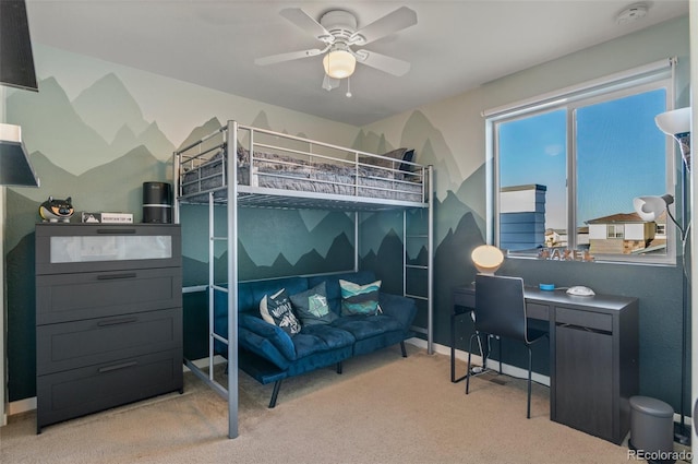 bedroom featuring ceiling fan and light colored carpet