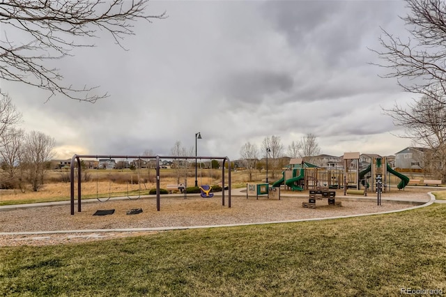 community playground featuring a yard