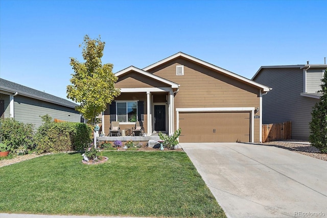 ranch-style house featuring driveway, a garage, and covered porch