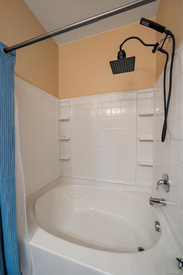 full bathroom featuring shower / bathtub combination with curtain