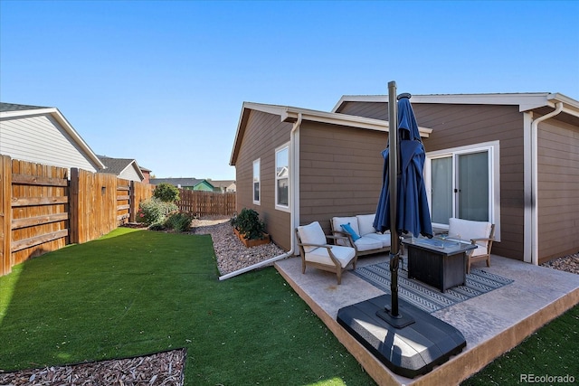 back of house with an outdoor hangout area and a patio area
