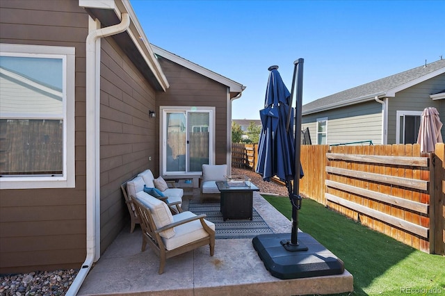 view of patio / terrace featuring fence