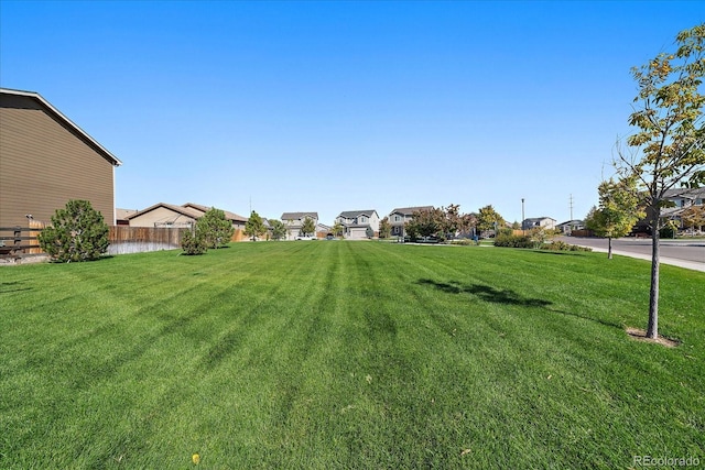 view of yard with a residential view