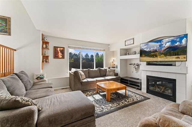 12978 Newport Way, Thornton, CO 80602 - carpeted living area with a tile fireplace