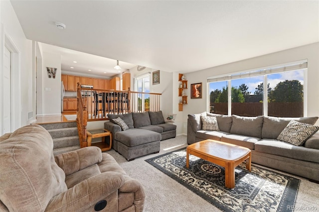 12978 Newport Way, Thornton, CO 80602 - living room featuring light carpet, recessed lighting, and stairway