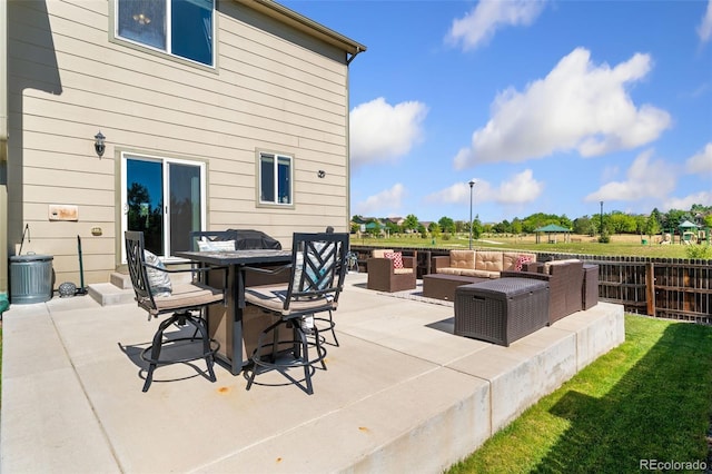 12978 Newport Way, Thornton, CO 80602 - view of patio with outdoor lounge area and outdoor dining area
