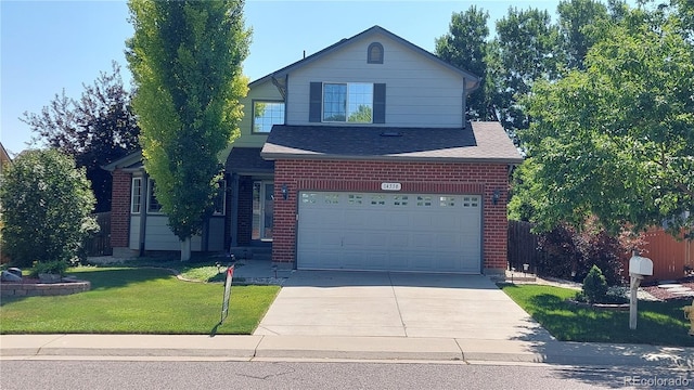 14558 Vine St, Thornton, CO 80602 - traditional home with driveway, a garage, a front yard, brick siding, and a shingled roof