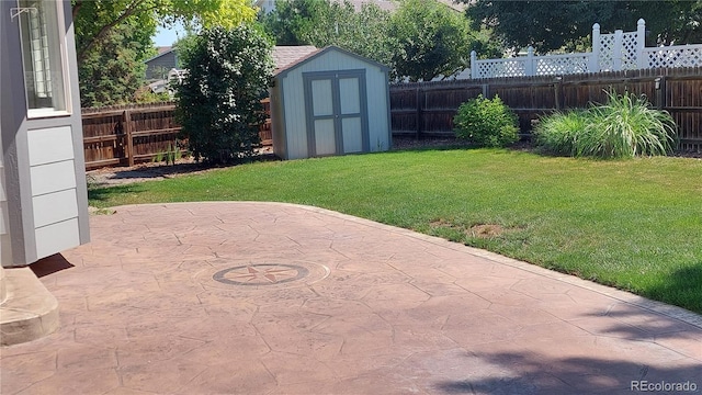 14558 Vine St, Thornton, CO 80602 - fenced backyard with a patio and a storage shed
