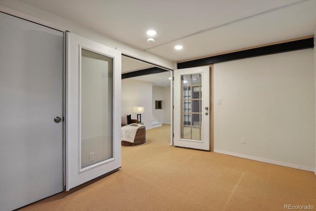unfurnished bedroom with baseboards, carpet, and recessed lighting