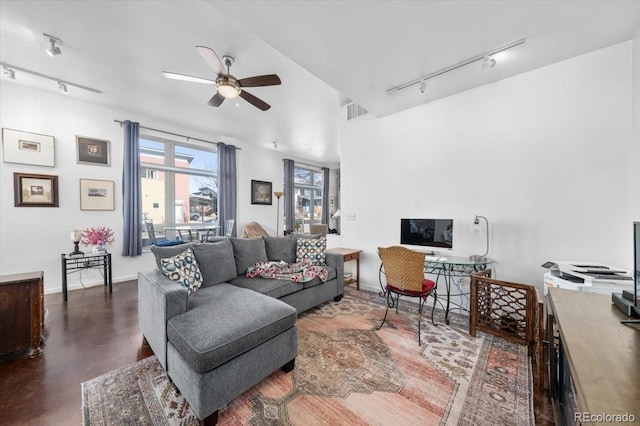 living room with track lighting and ceiling fan