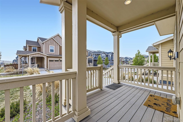 17530 E 95th Ave, Commerce City, CO 80022 - wooden terrace featuring a residential view and a garage