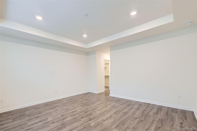 17530 E 95th Ave, Commerce City, CO 80022 - below grade area featuring wood finished floors, baseboards, and recessed lighting