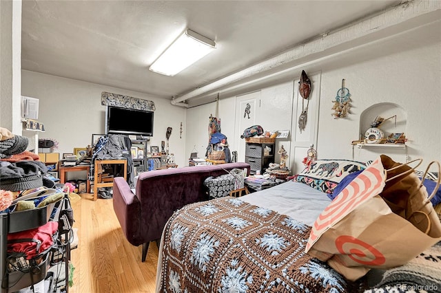 bedroom featuring wood-type flooring