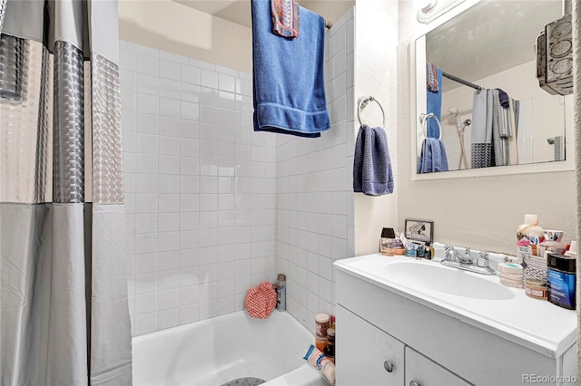 bathroom featuring vanity and shower / tub combo