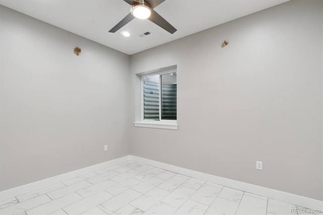 spare room featuring ceiling fan